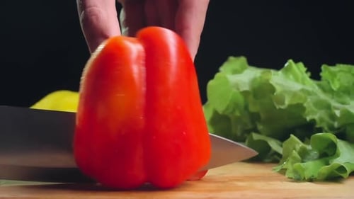 Red Bell Pepper Sliced with Sharp Knife