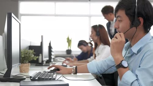 Call center young employee working with headset, Smiling customer support operator team