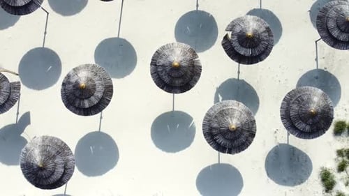 Empty Sandy Beach with Umbrellas Near the Sea Sunny Weather