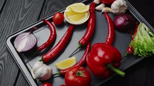Pepper with Herbs and Spices Ingredient for Tomato Sauce on Wooden Background Top View