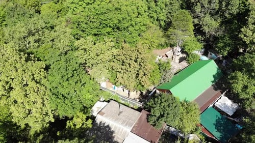 Flying over the village in the mountains.
