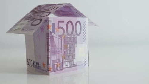 Slow tilt on European Union paper money house 4K 21650p 30fps UltraHD footage - Real estate made wi