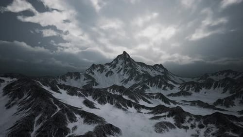 Aerial Flight Over Majestic Snowy Mountains