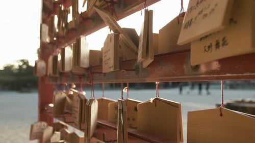 Wooden Plaques at Golden Hour Hanging at Temple