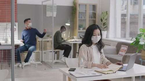 Colleagues Working in Office during Pandemic