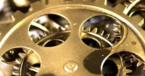 Close Up of Rotating Golden Gears