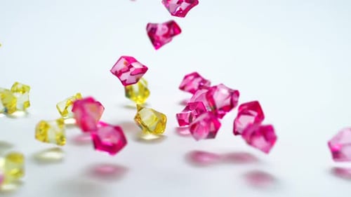 Dropping colorful acrylic stone, Slow Motion