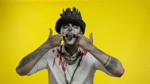 Scary Man in Halloween Costume with Spooky Make-up