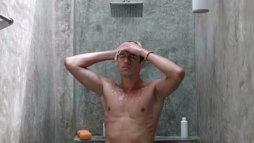 Front View Young Man Washing and Taking a Shower with Shower Bath and Washing Hair with Shampoo in