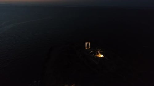 Temple of Apollo by night on the island of Naxos in Greece from the sky