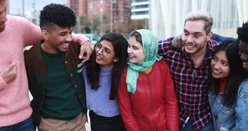 Group of happy people having fun outdoor laughing together