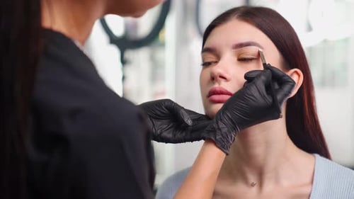 Eyebrow Shaping Treatment at a Bright Beauty Studio