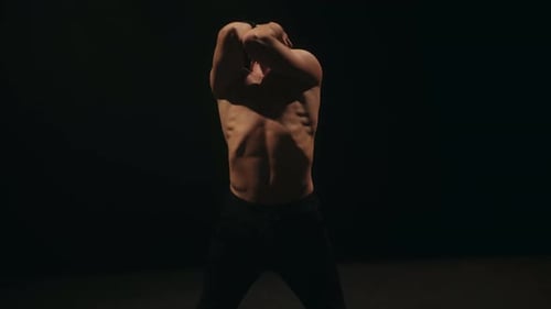 A Ballet Male Dancer is Performing Choreography on Classic Theater Stage