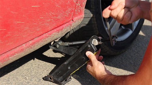 Lifting Car with a Jack