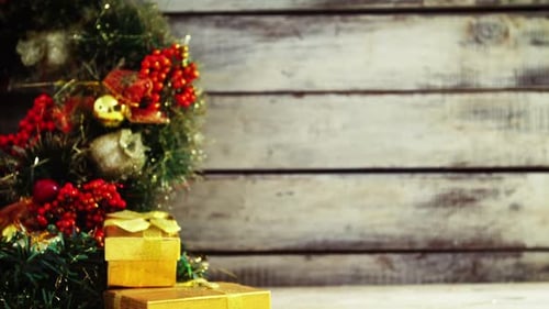 Christmas Garland with Gold Gifts and Rustic Backdrop