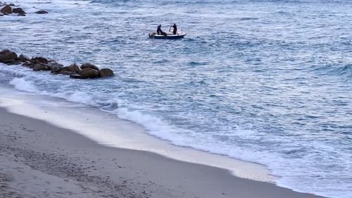 Fishermen In The Sea