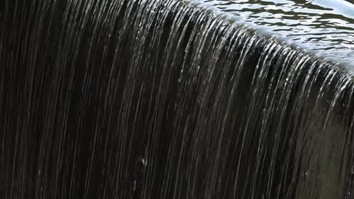Water Flowing Down a Stone Wall