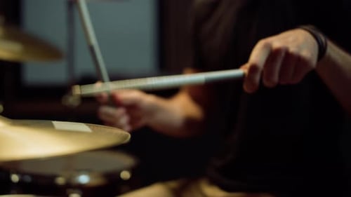 Unrecognizable Drummer Playing on Drum Kit in Studio. Musician Performing Solo