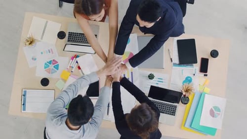 Diverse Business Team Hand Stack Celebration in Office