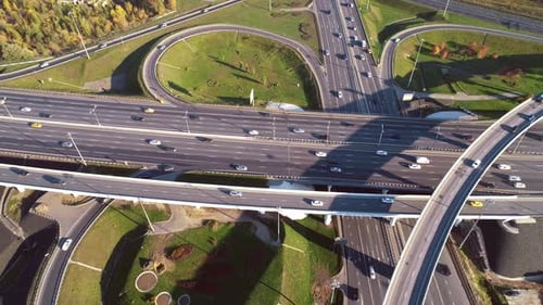 Aerial View of a Freeway Intersection Traffic Trails in Moscow