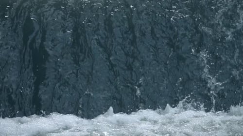 Waterfall Flowing into River