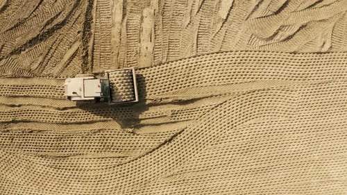 Busy Construction Site and Construction Equipment Aerial.