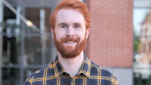 Smiling Man With Red Hair and Beard