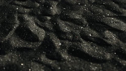 Seamless Loop of Dark Natural Sand Texture Background