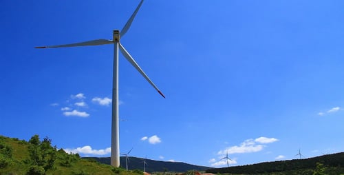 Wind Turbines Spinning on Rural Green Energy Farm