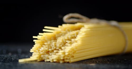 Bundle of Uncooked Spaghetti Tied with Twine