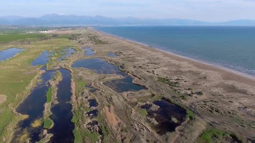 Aerial View of Coastline, Beach, and Natural Marsh
