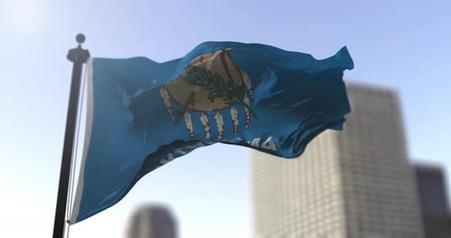 Waving Oklahoma State Flag Animation with City Background