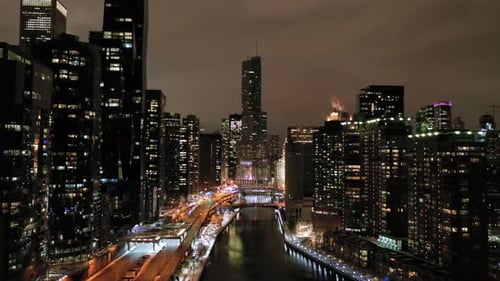 Urban Chicago City and Chicago River at Night in Winter