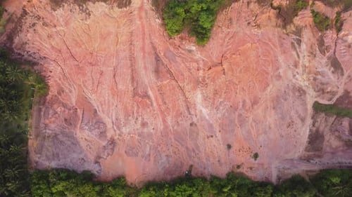 Aerial view look down red soil muddy land