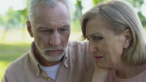 Old Couple Crying and Hugging, Supporting Each Other in Disease, Poverty