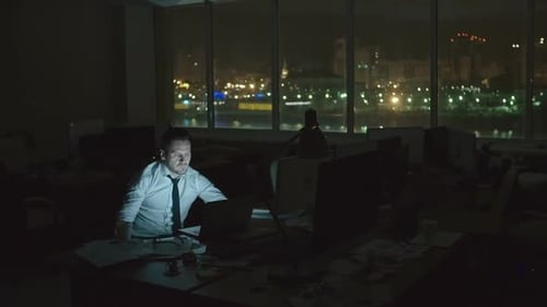 Businessman Working at Night Office
