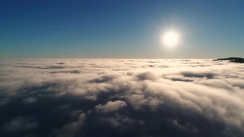Aerial View of White Clouds Against a Blue Sky