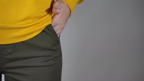 Front View on Body Part of Young Female on Gray Background with Copyspace for your Text
