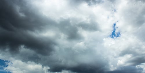 Storm Clouds Moving across a Cloudy Sky