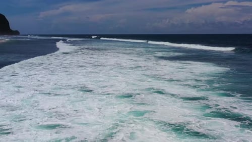 Waves and blue water as a background, View from drone at the ocean surface