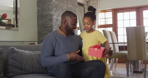 Loving Daughter Gives Red Birthday Gift to Father