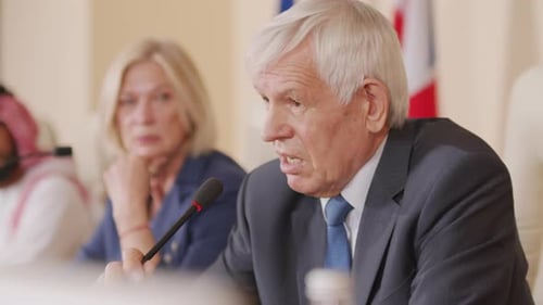 Man Speaks at International Conference Meeting