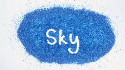 Writing 'Sky' in Blue Shavings on White