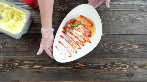 Pancake Dessert with Cream and Syrup Top View