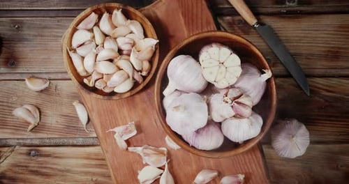 Garlic in Bowl on Cutting Board and Cool Steam