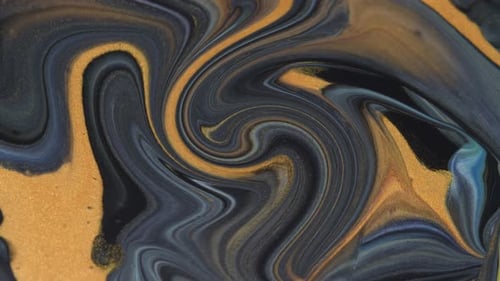 Swirling Abstract Design with Gold and Blue Paints