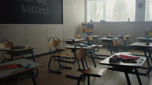 Classroom with Desks and Chairs in School