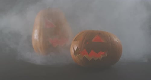 Spooky Carved Pumpkins in Fog