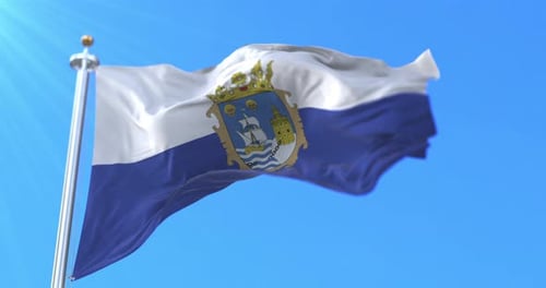 Realistic Waving Flag with Coat of Arms on Blue Sky