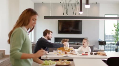 Family Enjoys a Healthy Breakfast Together at Home